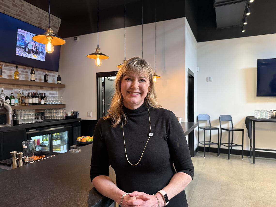 Kelly Magee stands at the interior bar of her new Q39 location in Lawrence.