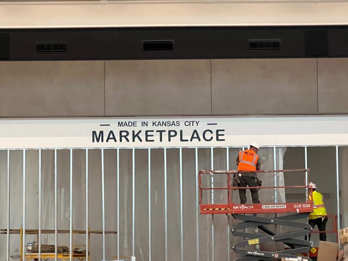 While the building that houses the new terminal at KCI Airport has been built, workers are building out the restaurant and retail shops inside the two concourses.