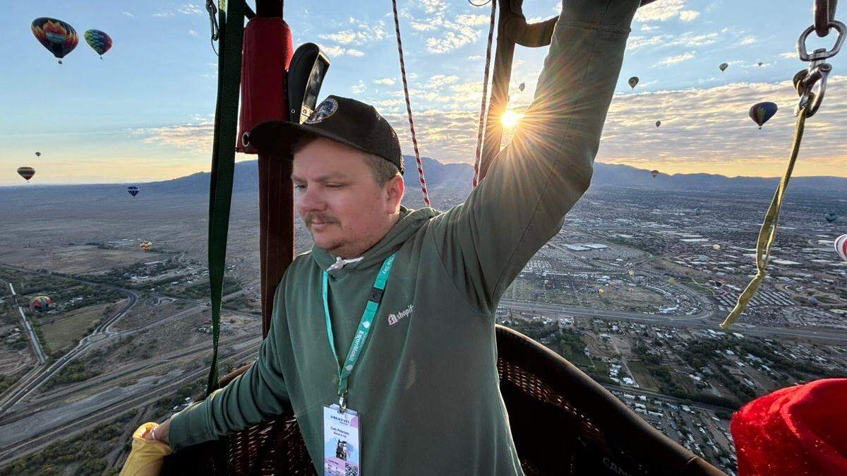 Cody Robinson of Kansas City pilots the “Grand Banana 2.0” which won 1st place in the 2024 Albuquerque International Balloon Fiesta competition.