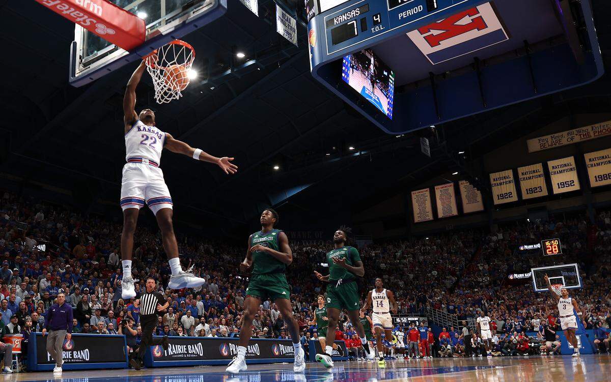 Guard Darryn Peterson #22 of the Kansas Jayhawks dunks on a fast break during the first half of the game against the Green Bay Phoenix at Allen Fieldhouse on November 3, 2025 in Lawrence.