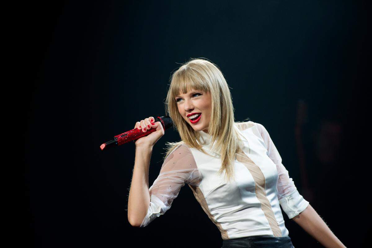 Taylor Swift sings on night one of her two Red Tour shows in August of 2013 at Sprint Center.