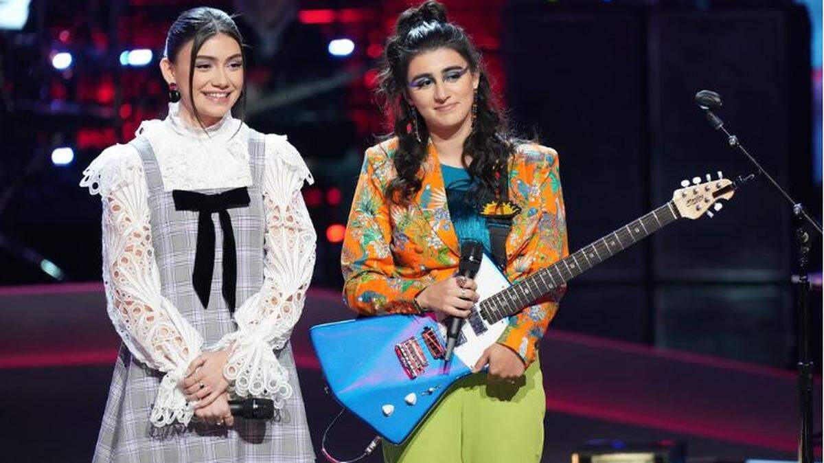 Kate Cosentino, right, a native of Overland Park, was eliminated Monday from “The Voice.” Coach Niall Horan chose to keep Cosentino’s teammate Gina Miles instead.