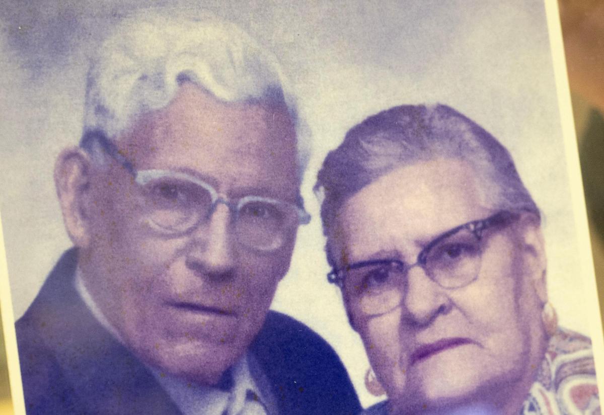 A framed portrait of Alberto Perez, left, and Maria Anaya Perez is displayed in the office of Perez Food Products. Alberto used to play mariachi on the Plaza.