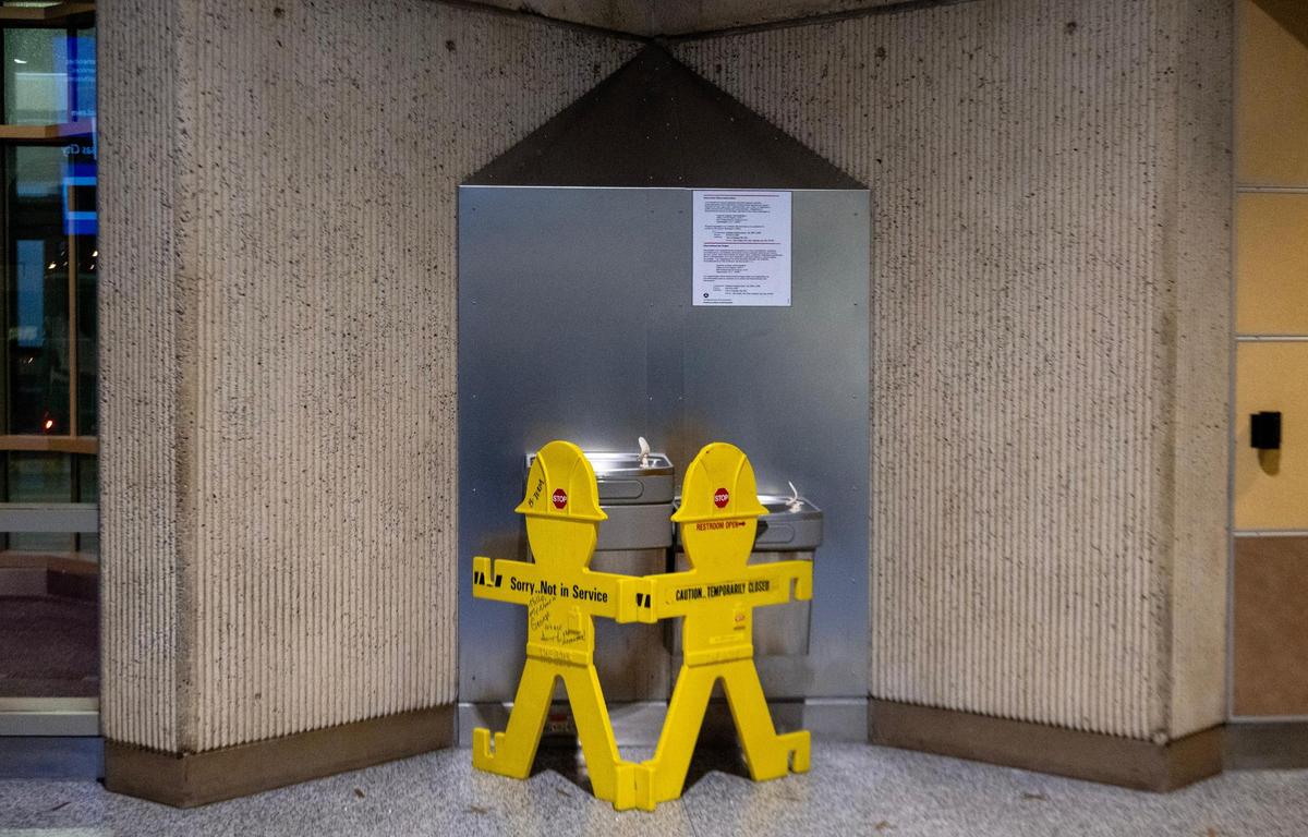 Signage indicates an out of service water fountain on the last day of operation at Kansas City International Airport’s old terminals on Monday, Feb. 27, 2023, in Kansas City.