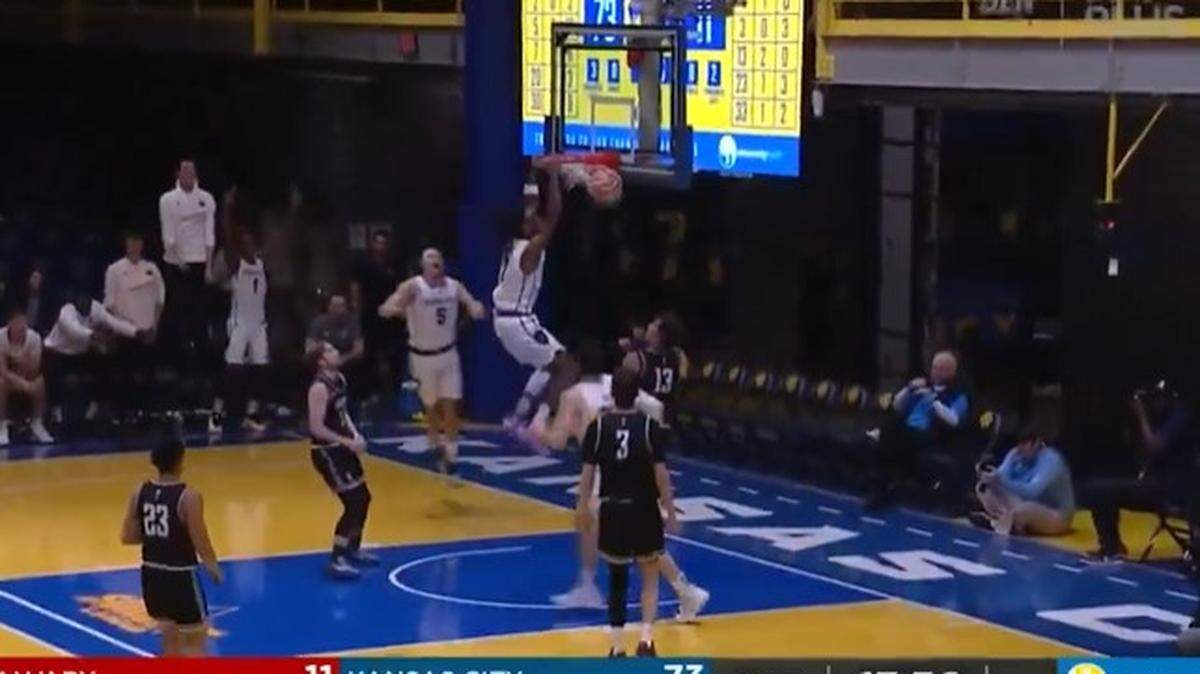 Kasheem Grady dunked in the second half for Kansas City.