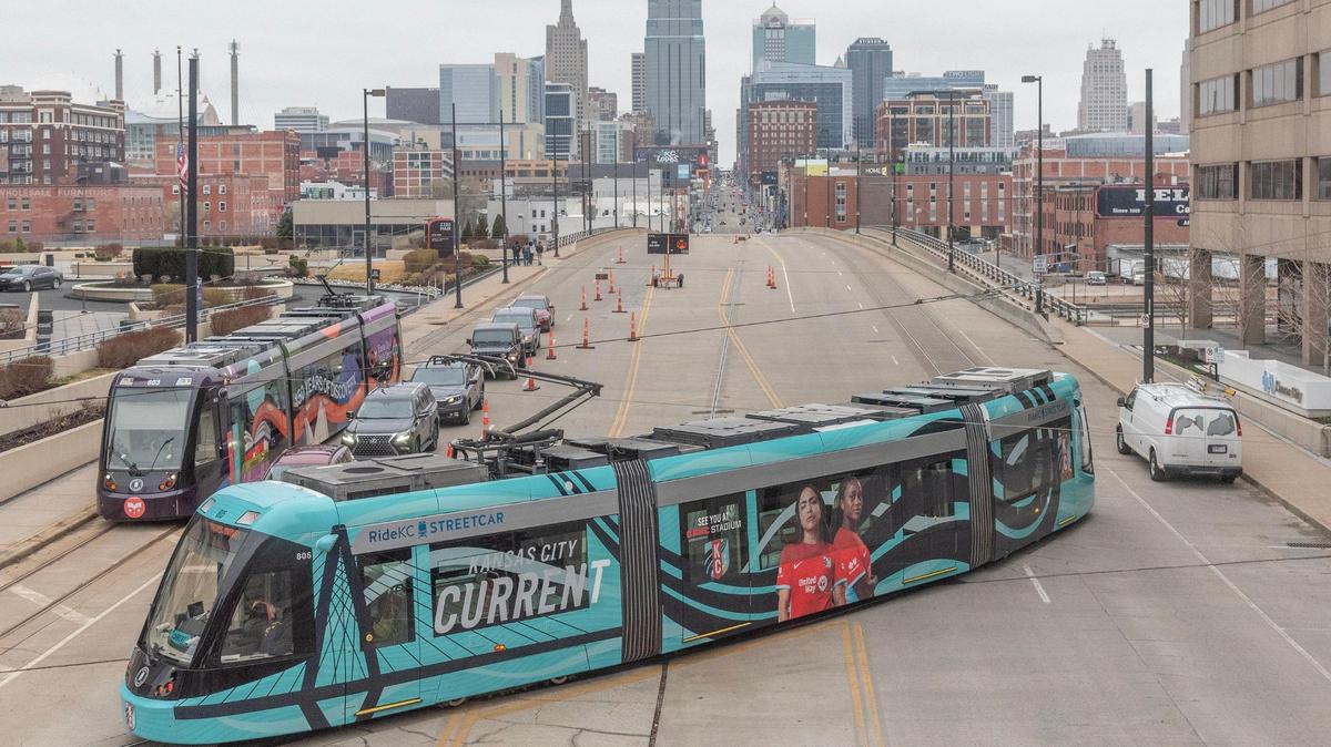 The third version of the Kansas City Current wrapped streetcar rolled into the Union Station stop Friday for its unveiling ceremony. The Kansas City streetcar, wrapped in a design for the Current women’s soccer team, shows off its new look in March 2024 at Union Station.