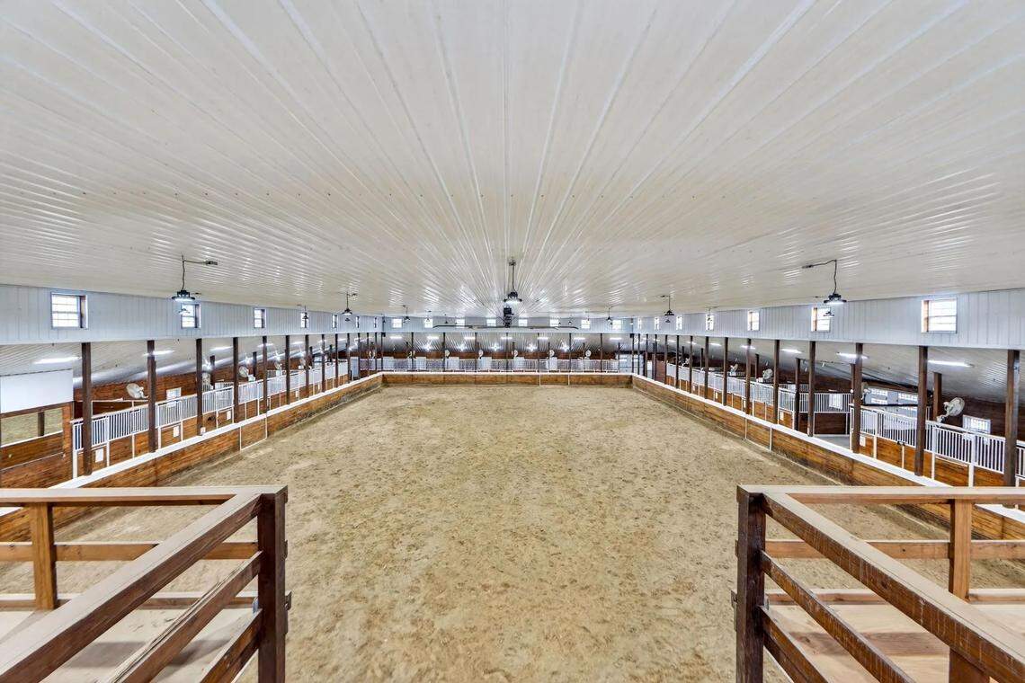 A full-sized equestrian arena is part of the property as well.