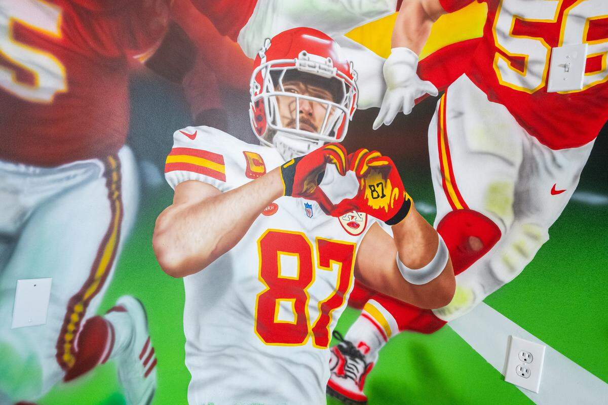 Of course Travis Kelce is on the wall.
