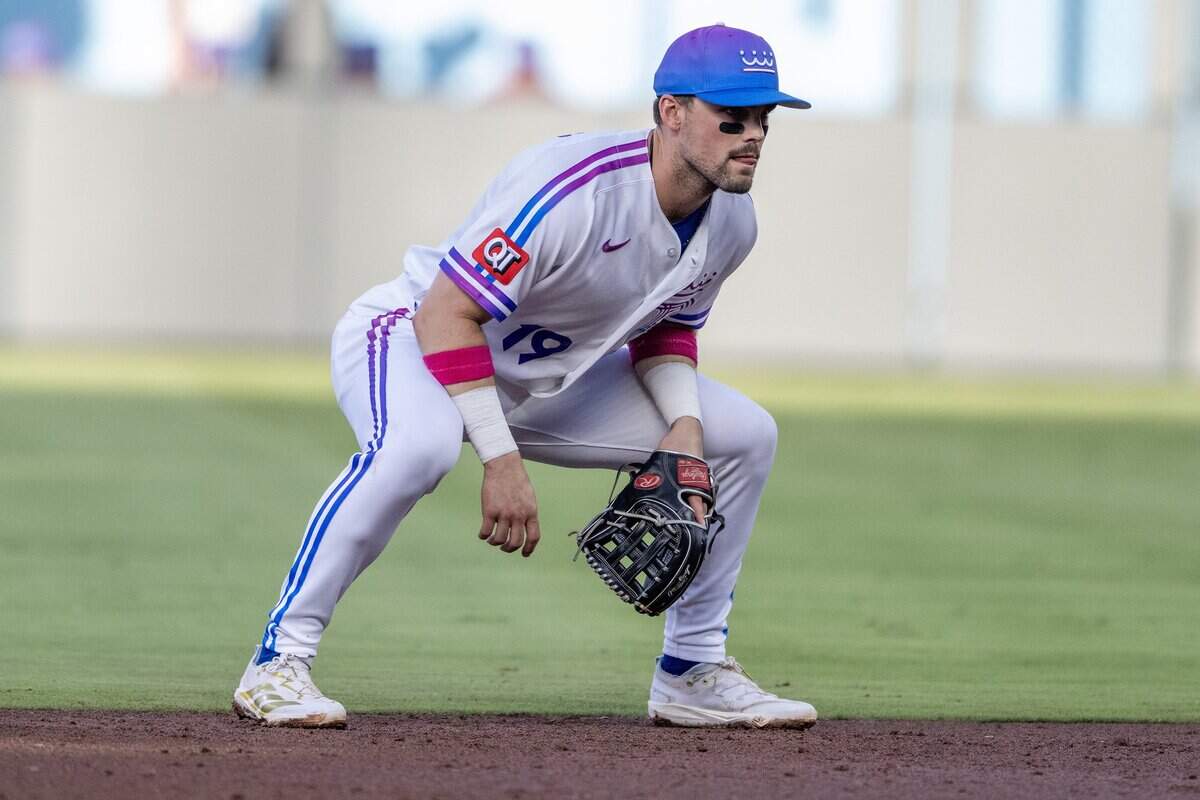 Wearing the Kansas City Royals' new "Forever Fountains" City Connect uniform, second baseman Michael Massey (19) watches a play in the first inning against the Houston Astros on Friday, June 12, 2026, at Kauffman Stadium in Kansas City.