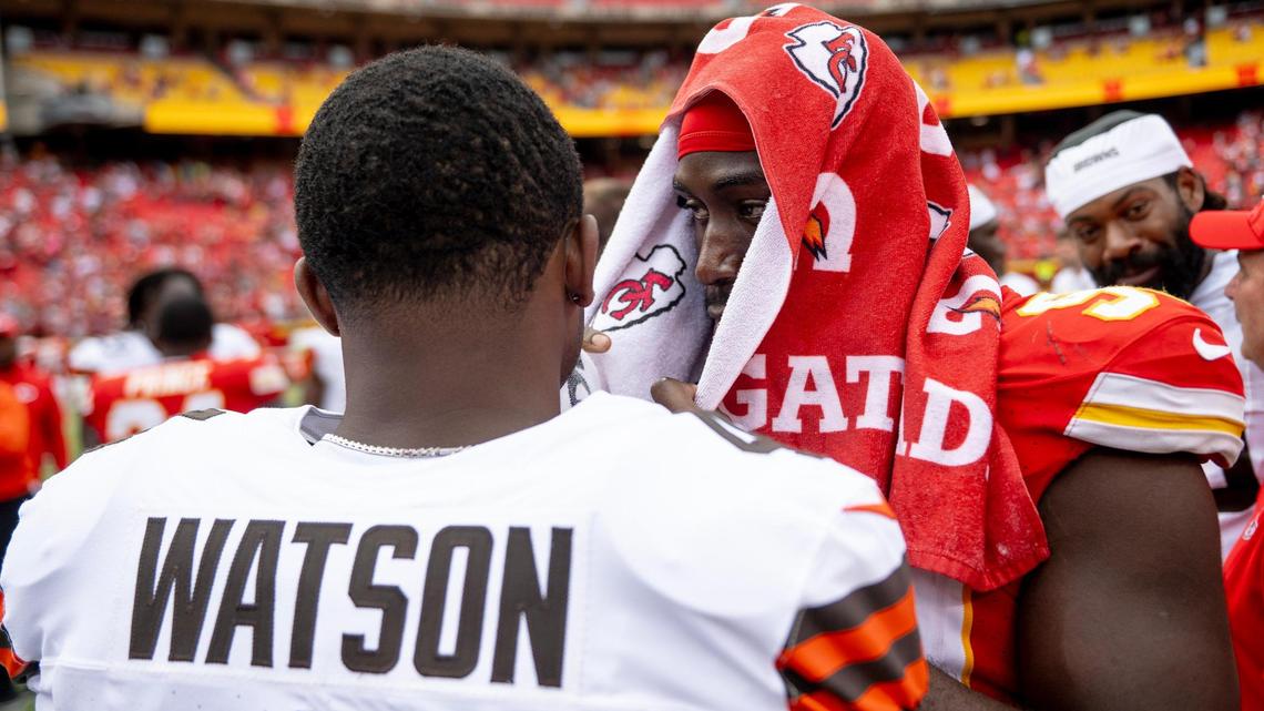 Kansas City Chiefs defensive end Charles Omenihu (90) speaks with Cleveland Browns quarterback Deshaun Watson (4) on the field after the Chiefs defeated the Browns 33-32 in an NFL preseason football game on Saturday, Aug. 26, 2023, in Kansas City.
