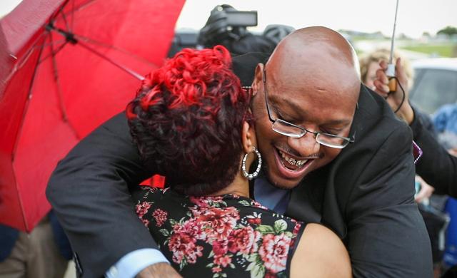 Ricky Kidd hugs his friend, Harriet Clark, after being freed from the Western Missouri Correctional Center on Thursday, Aug. 15, 2019. DeKalb County Circuit Court Judge Daren Adkins ordered Kidd’s release, finding him innocent of the 1996 double murder.