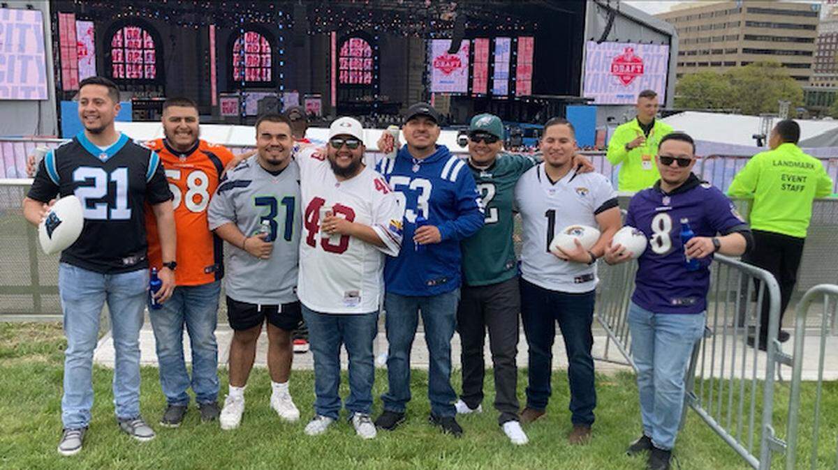 Eight friends from Kansas, eight different loyalties. None to the Kansas City Chiefs. From left: Jairo Martinez, 34; Alex Camacho, 23; Michael Camarena, 19; Brayan Carrasco, 24; Luis Carrasco, 29; Leo Orozco, 25; Jayme Fuentes, 32; Erick Robles, 27.