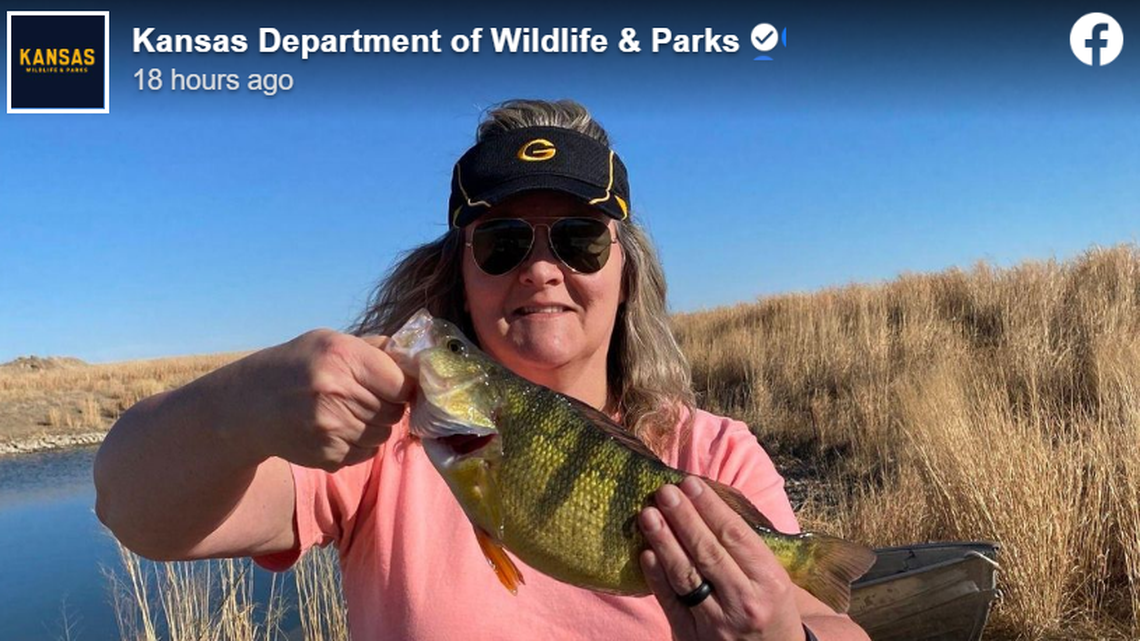 Tami Sanderson with her record-breaking yellow perch.