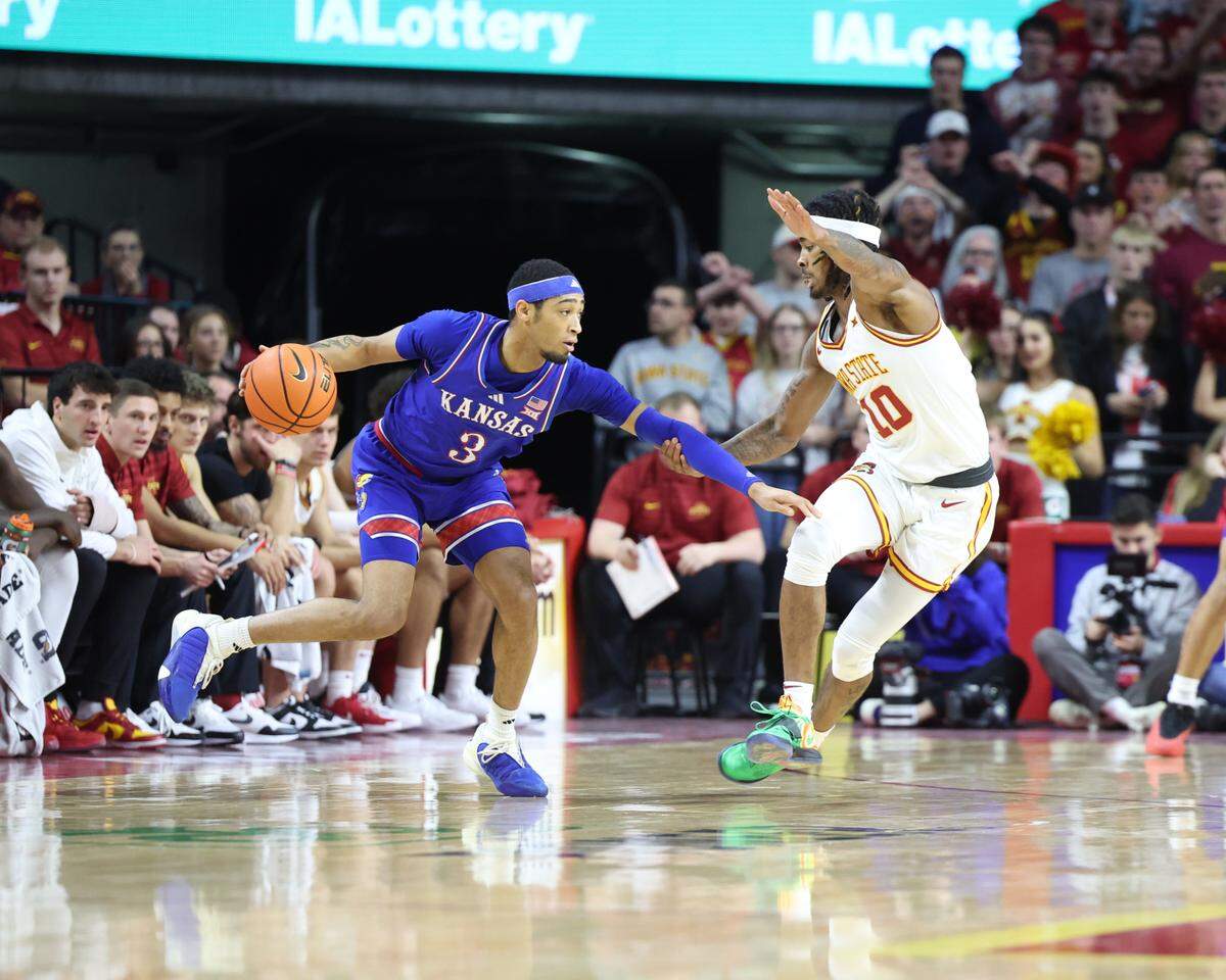 Iowa State Cyclones guard Keshon Gilbert (10) defends Kansas Jayhawks guard Dajuan Harris Jr. (3) in the first half at James H. Hilton Coliseum on Jan. 15, 2025.