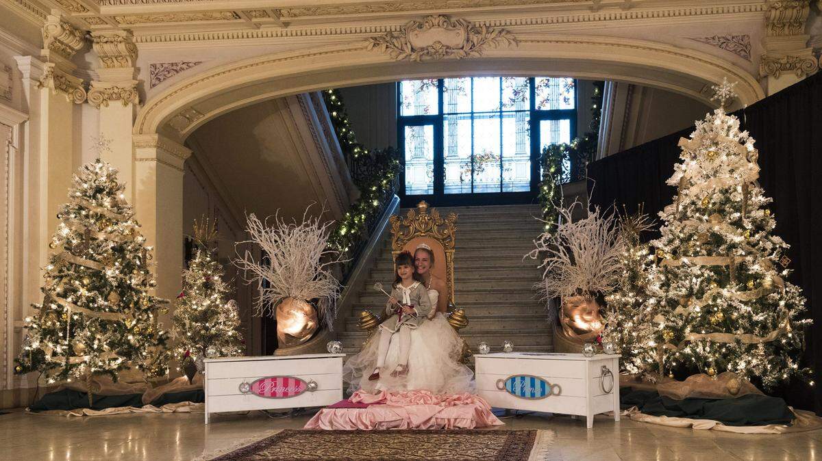 Emma Braun, 6, visited the Fairy Princess, Renee Rosinski, at the Kansas City Museum in 2016. After the years-long renovation of the museum, the Fairy Princess will hold court in the Betty Milbank Waldrop Salon from Dec. 8 through Dec. 11.