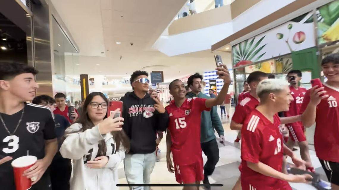 Wearing sunglasses, a Patrick Mahomes impostor known as Z caused quite a commotion at Oak Park Mall on Feb. 25 as fans rushed him and even ran after him to grab pictures.
