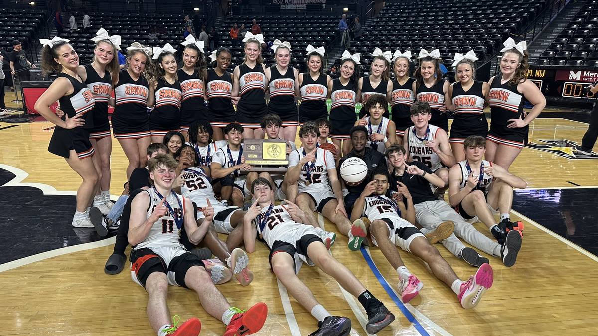 Shawnee Mission Northwest celebrates after winning the Kansas Class 6A state championship on Saturday in Wichita.