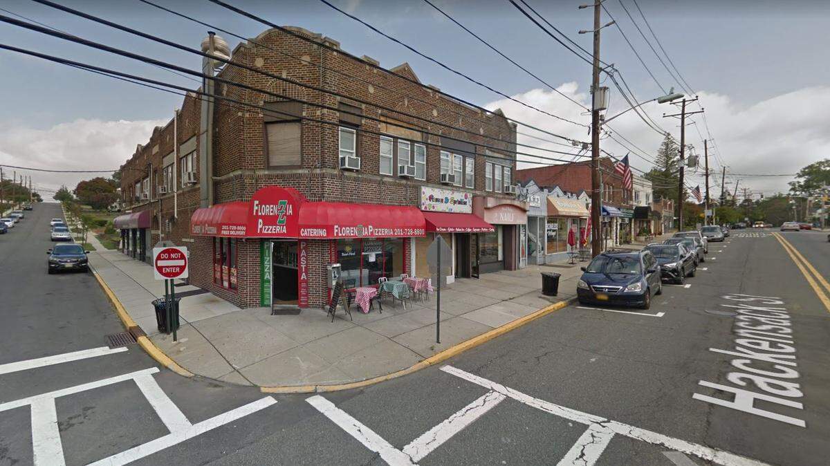 A Google Earth image shows the former New Jersey headquarters for Skyline Healthcare above a pizza parlor.