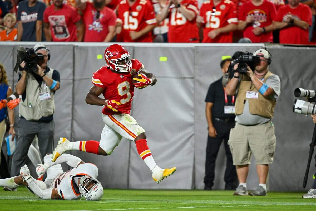 Kansas City Chiefs running back Kenneth Walker III (9) runs the ball for a 60-yard touchdown to start the second half of the Kansas City Chiefs vs. Denver Broncos NFL season opener at Arrowhead Stadium in Kansas City on Sept. 14, 2026.