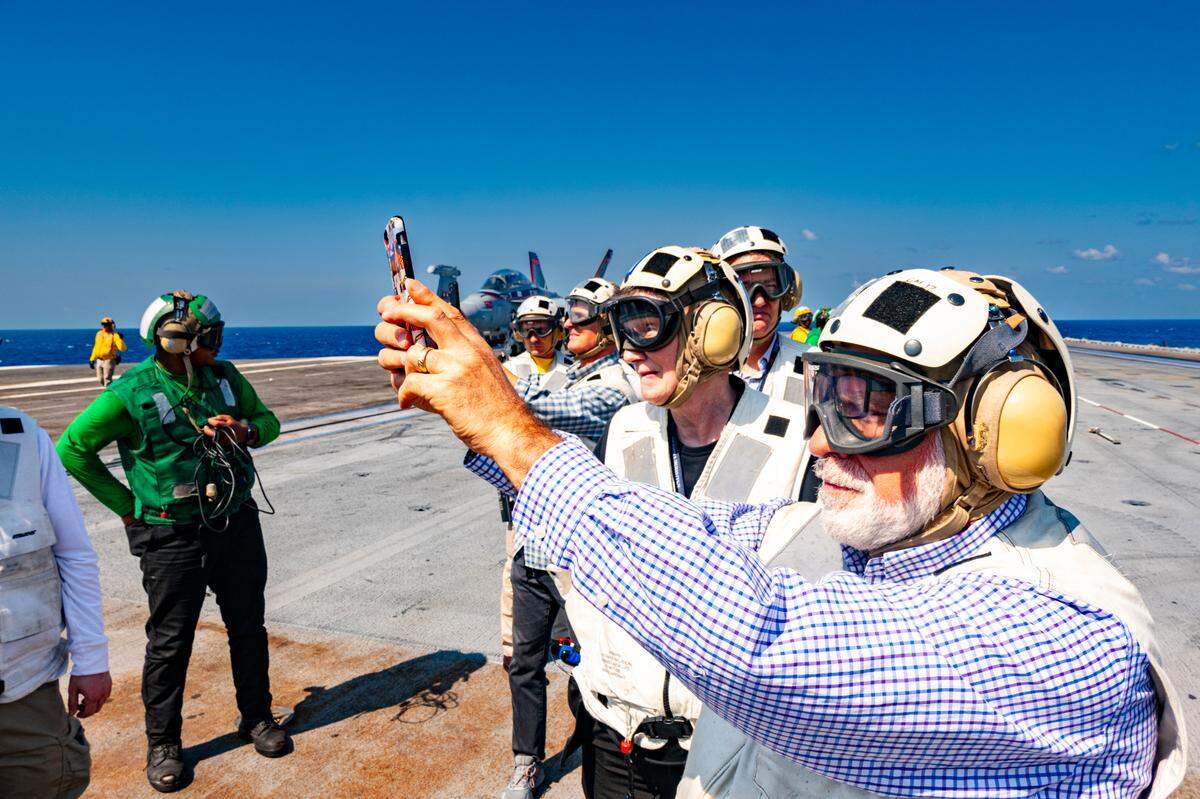 KC Star columnist Vahe Gregorian and other guests of the U.S. Navy traveling with the Harry S. Truman Presidential Library and Museum observe flight operations aboard the namesake aircraft carrier of the man from Independence who became the 33rd president of the United States.