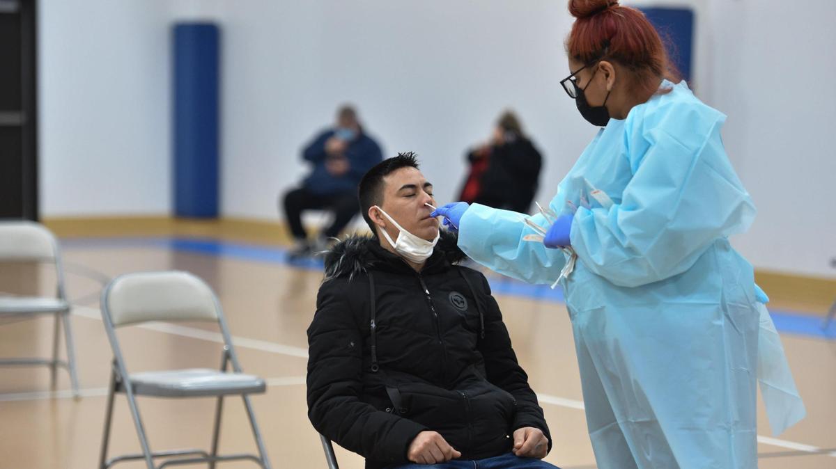 Jesus Cisneros of Kansas City, Kansas, was swapped for a COVID-19 test by a Vibrant Health worker on Monday, Jan. 3, 2022, at Oak Ridge Baptist Church, 9301 Parallel Parkway in Kansas City, Kansas. The free testing requires no appointment and is open to anyone. Testing will continue from 8:30 a.m. to 5 p.m. on Tuesday and Wednesday at the church.