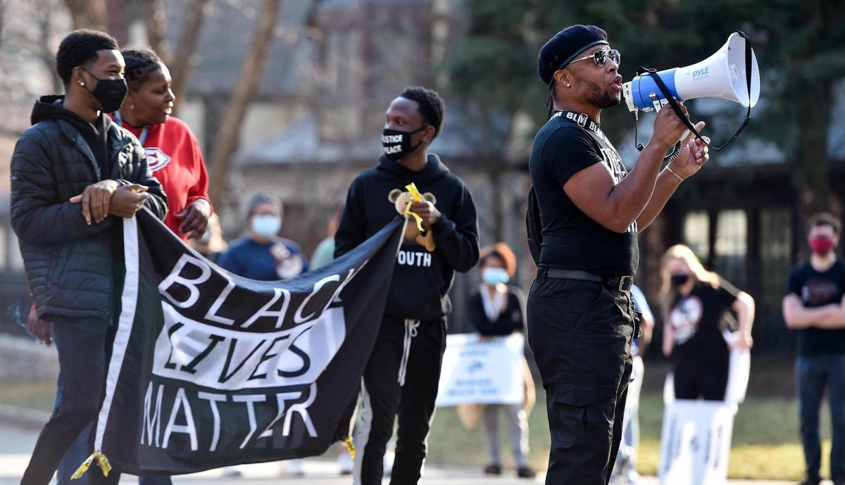 Several dozen people joined family members of Donnie Sanders to march for justice. The Jackson County Prosecutor’s Office said there was insufficient evidence to charge Officer Blayne Newton, who fatally shot Sanders in March last year. The march started at Arno Park at Ward Parkway and W. 69th Street and went to W. 70th Street and Valley Road, where organizer Anton Washington, right, spoke.
