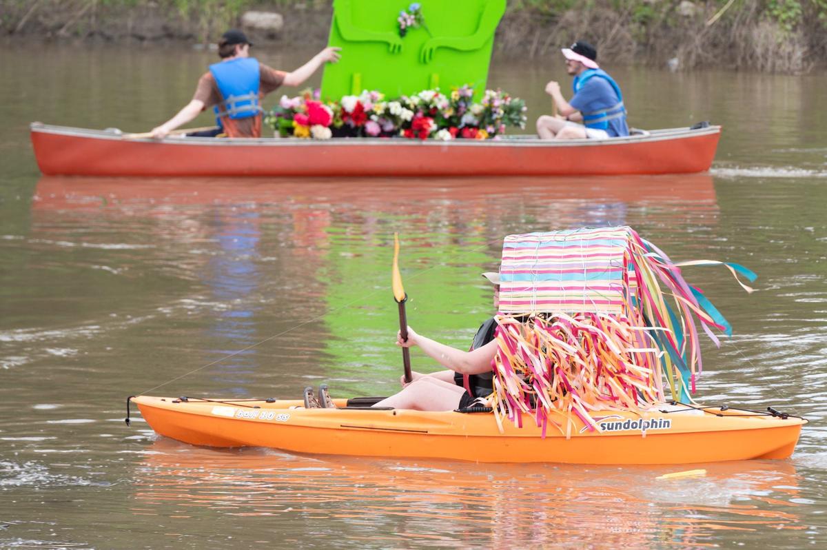 Participants in the Kawsmouth River Carnival boat parade on Saturday leave Kaw Point Park in Kansas City, Kansas, and travel down the Missouri River to the Riverfront Park boat ramp in Kansas City.
