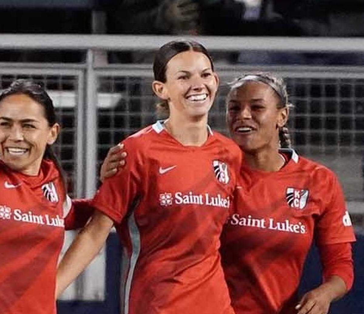 KC Current forward Cece Kizer celebrates a goal with teammates during an NWSL match between the KC Current and Chicago Red Stars.