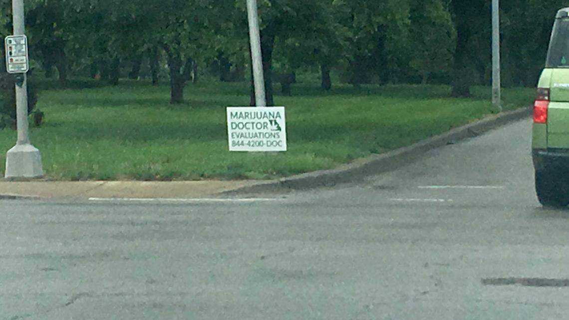 Clinics in Missouri are beginning to market medial marijuana evaluations. This sign, posted in the median along Ward Parkway last month, advertises the phone number for the Missouri Cannabis Clinic in Raytown.