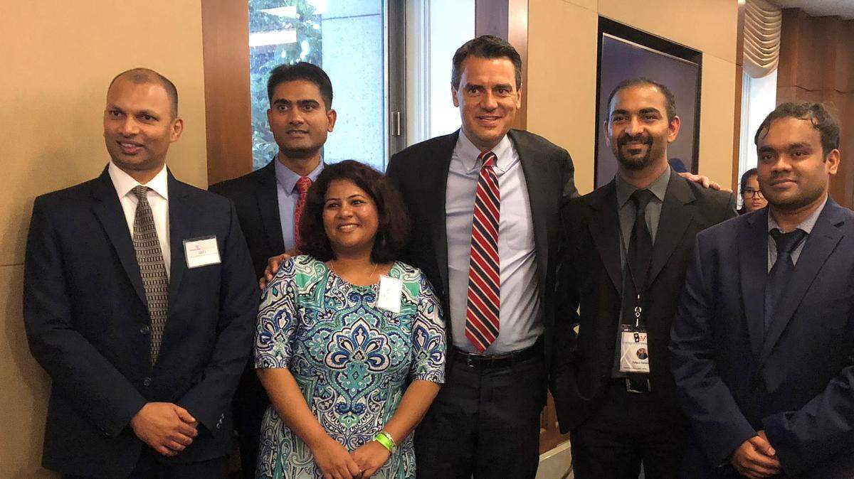 Rep. Kevin Yoder poses with Sunayana Dumala (front), whose husband was murdered in a hate crime Yoder’s district last year, and other Indian born activists from the Kansas City area seeking green card reform during an event in Washington, D.C.