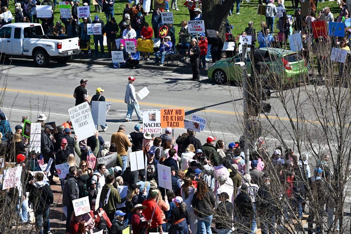 Protesters gathered in Mill Creek Park near the Country Club Plaza on Saturday, March 28, 2026, for a No Kings protest against the Trump administration. It's the third round of No Kings protests that have swept the nation over the past year.