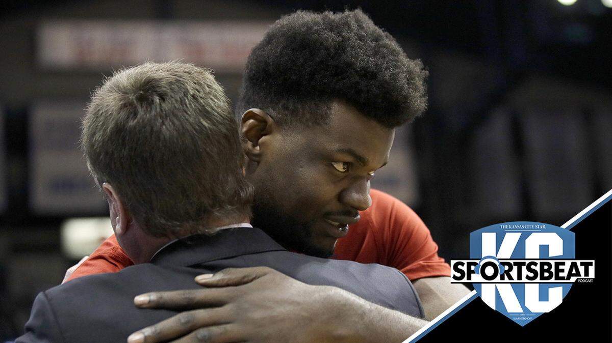 Kansas senior center Udoka Azubuike hugs coach Bill Self before the team’s NCAA college basketball game against TCU in Lawrence, Kan., Wednesday, March 4, 2020. It was the last game in Allen Fieldhouse for Azubuike. (AP Photo/Orlin Wagner)