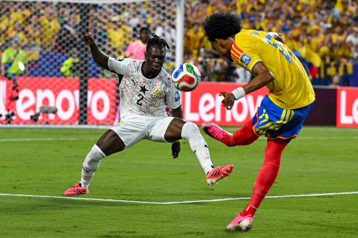 Ghana defender Alidu Seidu (2) plays defense in the first half of the Colombia vs. Ghana 2026 World Cup Round of 32 football match at Kansas City (Arrowhead) Stadium in Kansas City on Friday, July 3, 2026.