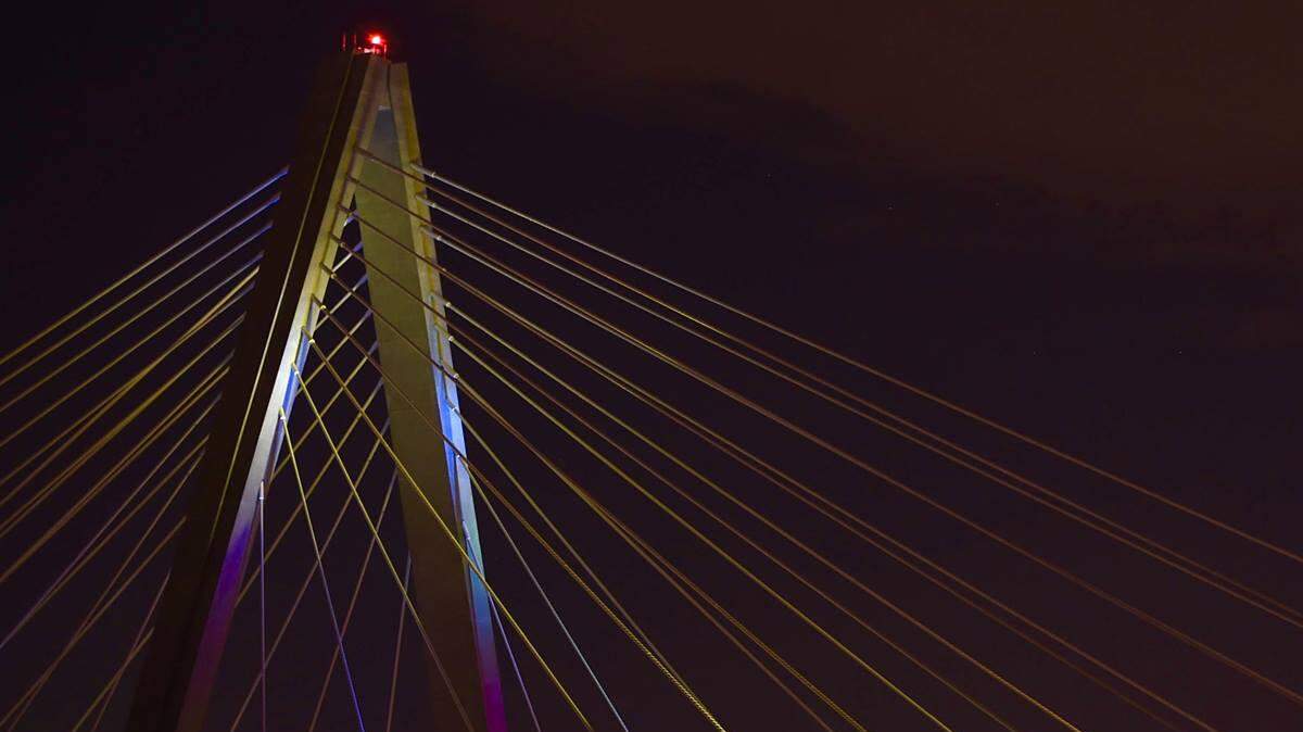 The Bond Bridge over the Missouri River was illuminated in rainbow colors Monday night, part of a citywide tribute to the victims of the weekend massacre at the Pulse gay nightclub in Orlando, Fla.