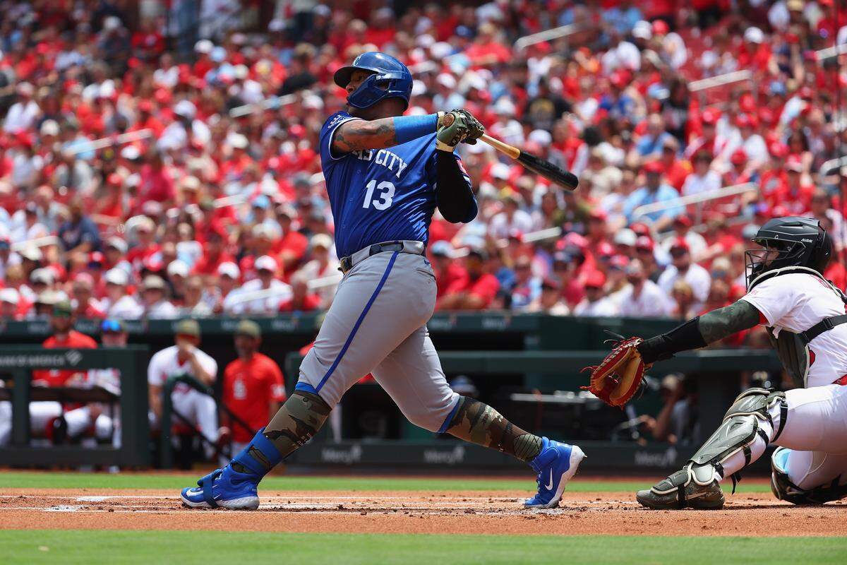 Kansas City Royals catcher Salvador Perez hits a first-inning sac fly against the Cardinals during an I-70 Series finale at Busch Stadium in St. Louis on Sunday, May 17, 2026.