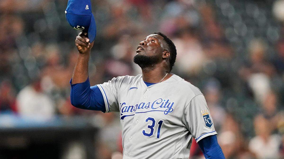 Kansas City Royals reliever Tapia Domingo reacts after pitching in the fourth inning in the second baseball game of a doubleheader against the Cleveland Indians, Monday, Sept. 20, 2021, in Cleveland. (AP Photo/Tony Dejak)
