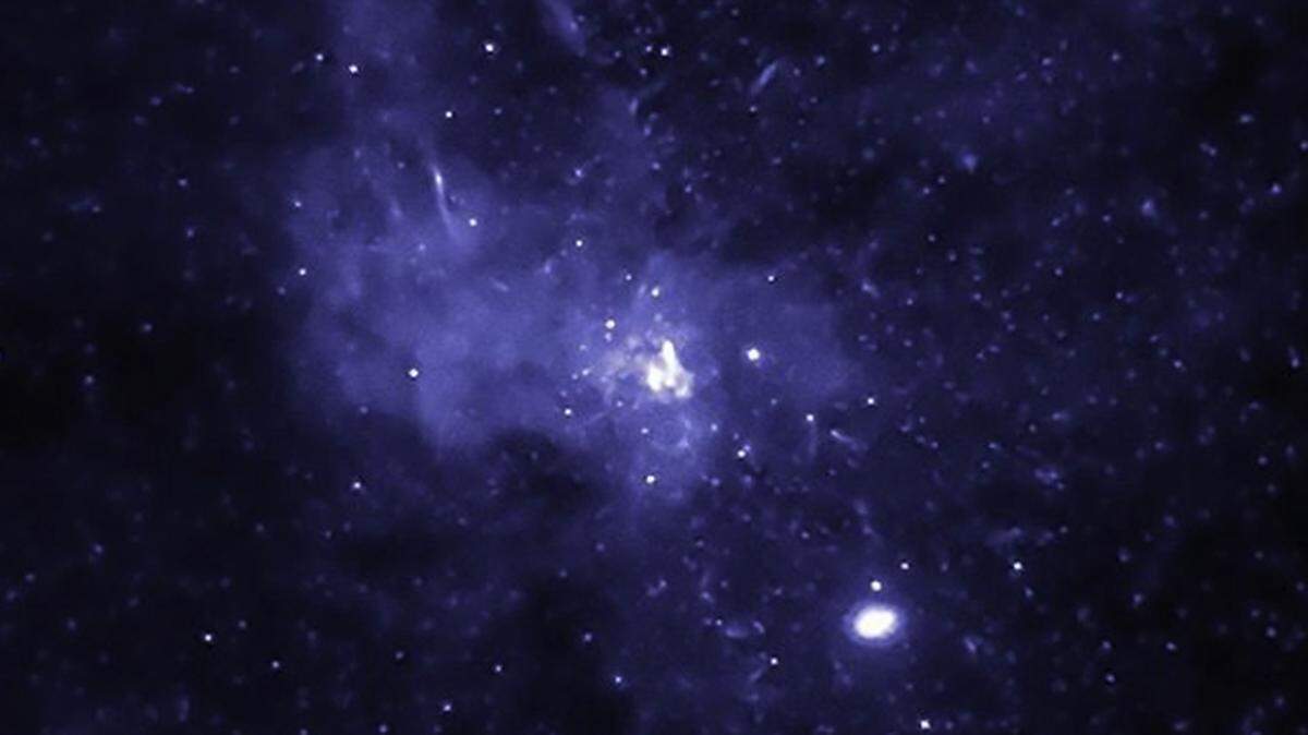 A black hole, like this one pictured here, has a gravitational pull so intense that nothing, not even light, can escape it, according to NASA. Scientists think that mysterious, invisible radio bursts detected in space might be caused by black holes or dense stars colliding, but they’re not sure.