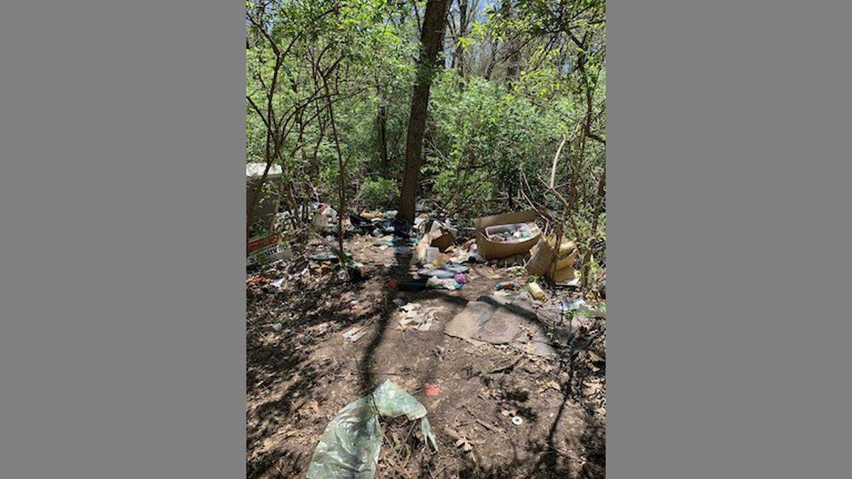 An anonymous tip led police to a wooded area off Bannister and Norfleet roads, where they found the Holmes family’s stolen U-Haul and car and their possessions strewn about.