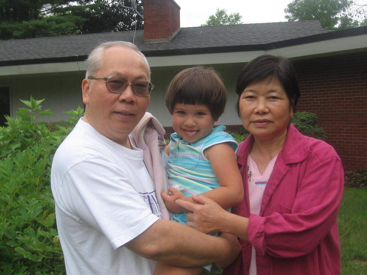 Schlueter at age 3 with her grandpa, Yeh Yeh, and grandma, Po Po, in April 2007