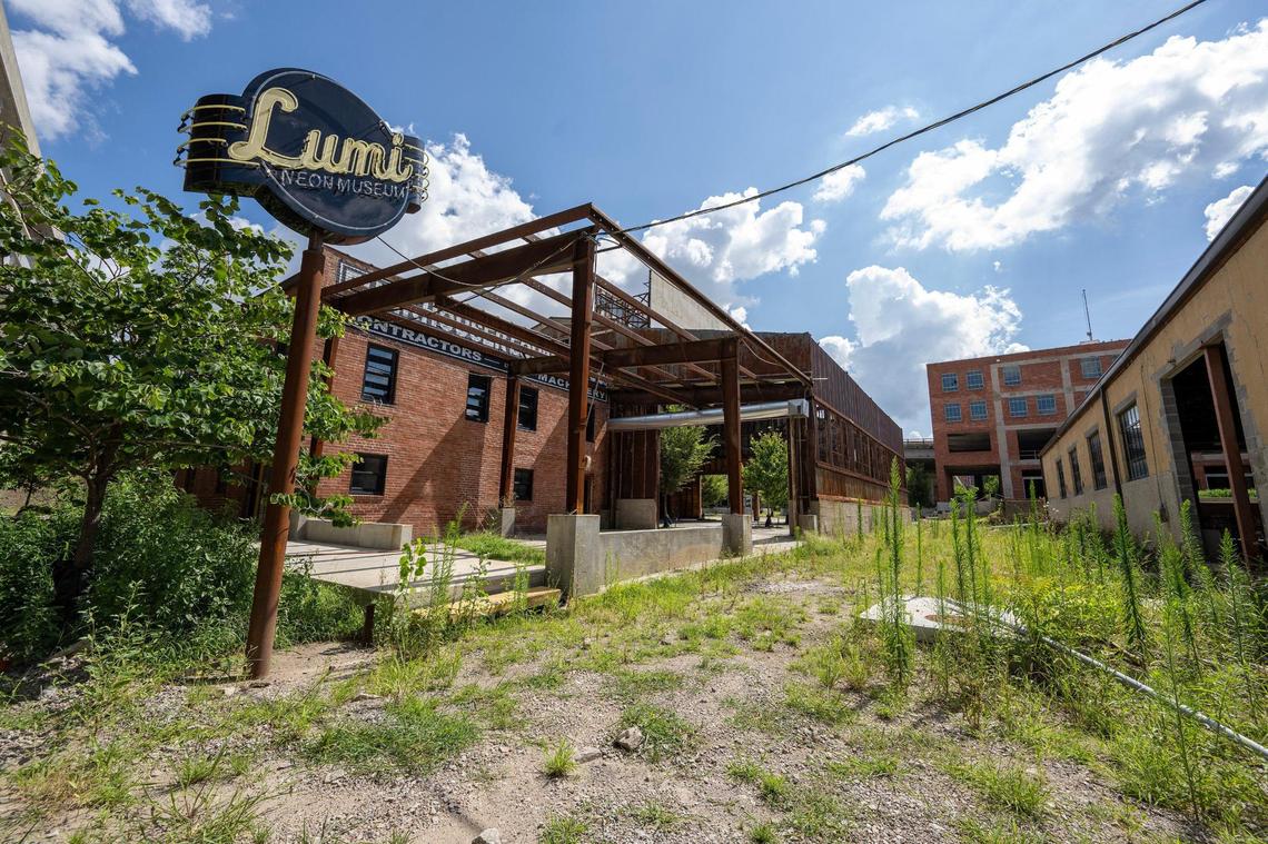Weeds and overgrown brush spread across part of Pennway Point. Located north of the Ferris wheel, the planned entertainment district, originally scheduled to open in 2023, has been continuously delayed.