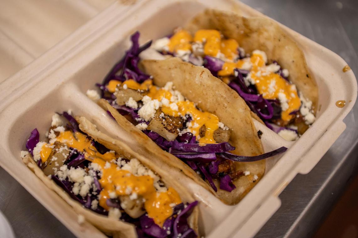 Goods by Good offers grilled Hawaiian chicken Thai tacos topped with shredded red cabbage, queso fresco, sautéed pineapples and spicy mayo.