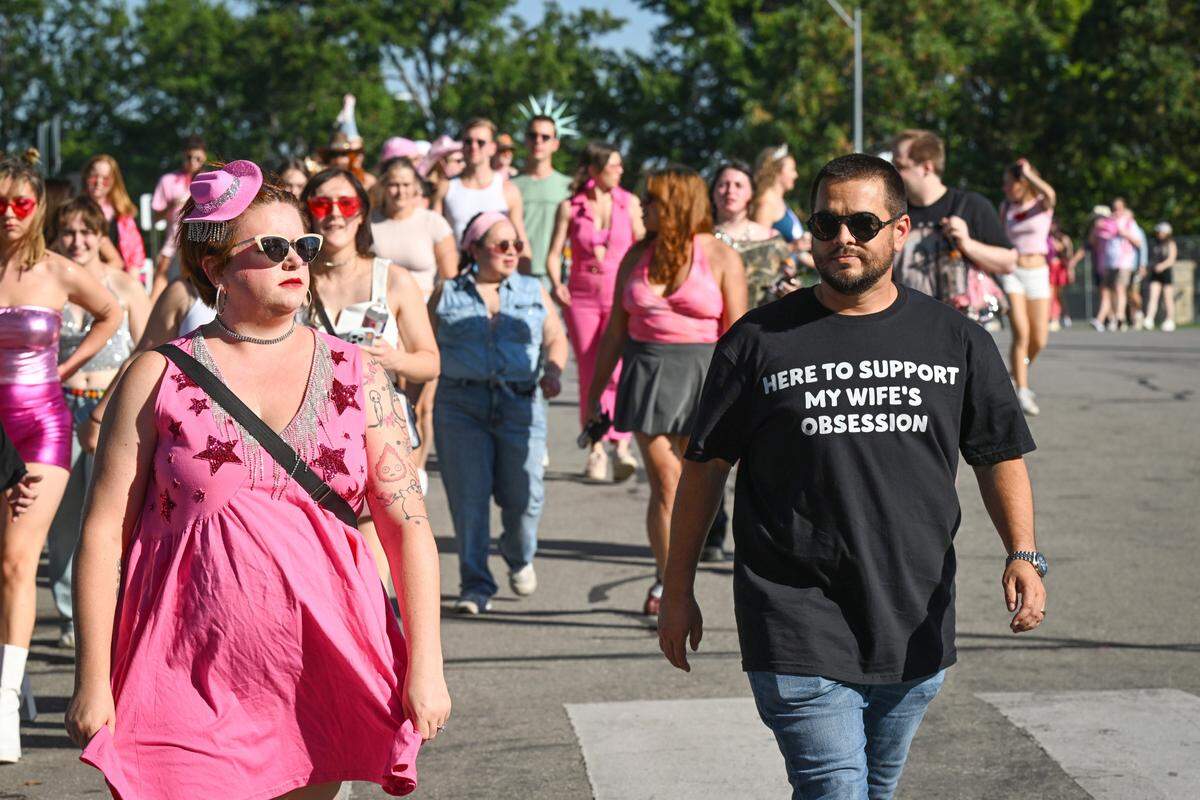 Josh Williams and Rebecca Rader, Tulsa, walked through the concert grounds before the Chappell Roan concert on Saturday, Oct. 4, 2025, at the National WWI Museum and Memorial in Kansas City.