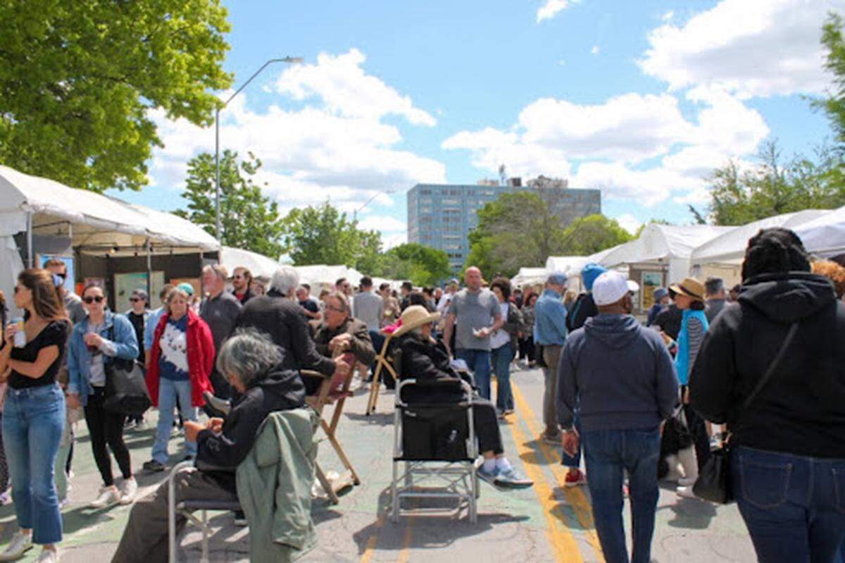 Crowds flooded the Brookside Shops for the 39th annual art fair in the Kansas City neighborhood on Saturday, May 3.
