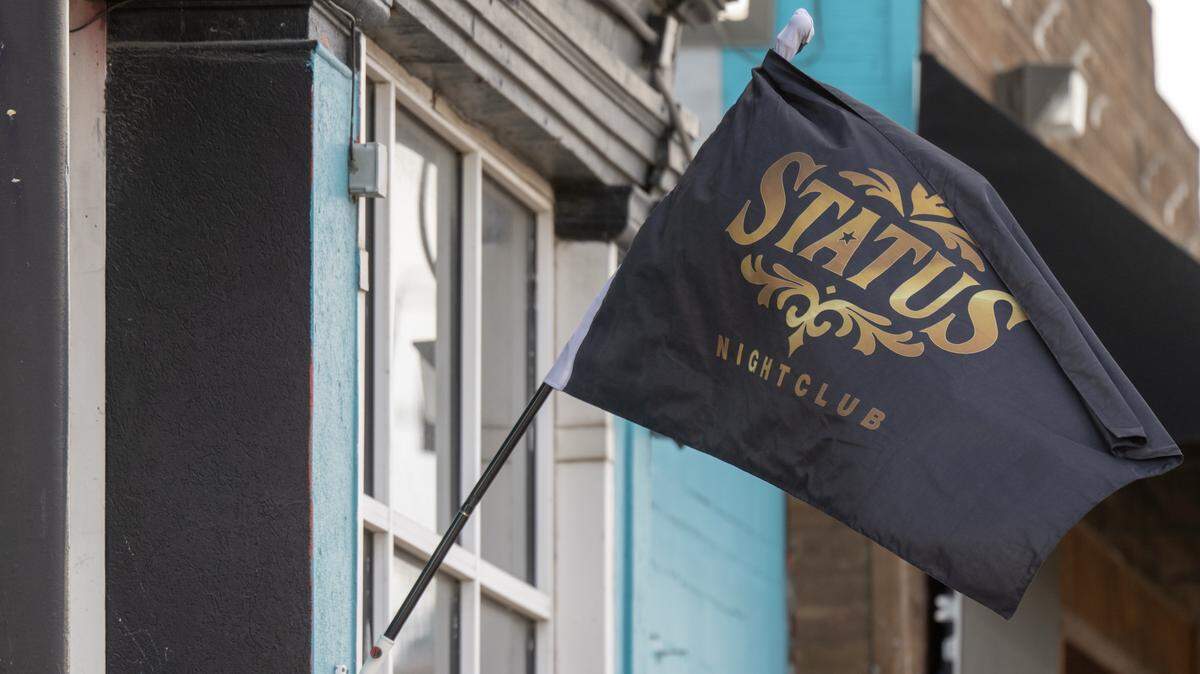One day after a shooting left two women dead, a Status Nightclub flag flies outside the nightclub at 2801 Southwest Blvd., on Monday, Feb. 16, 2026, in Kansas City. Two women were fatally shot and two other people were injured in a shooting at the night club on Sunday, Feb. 15, 2026.