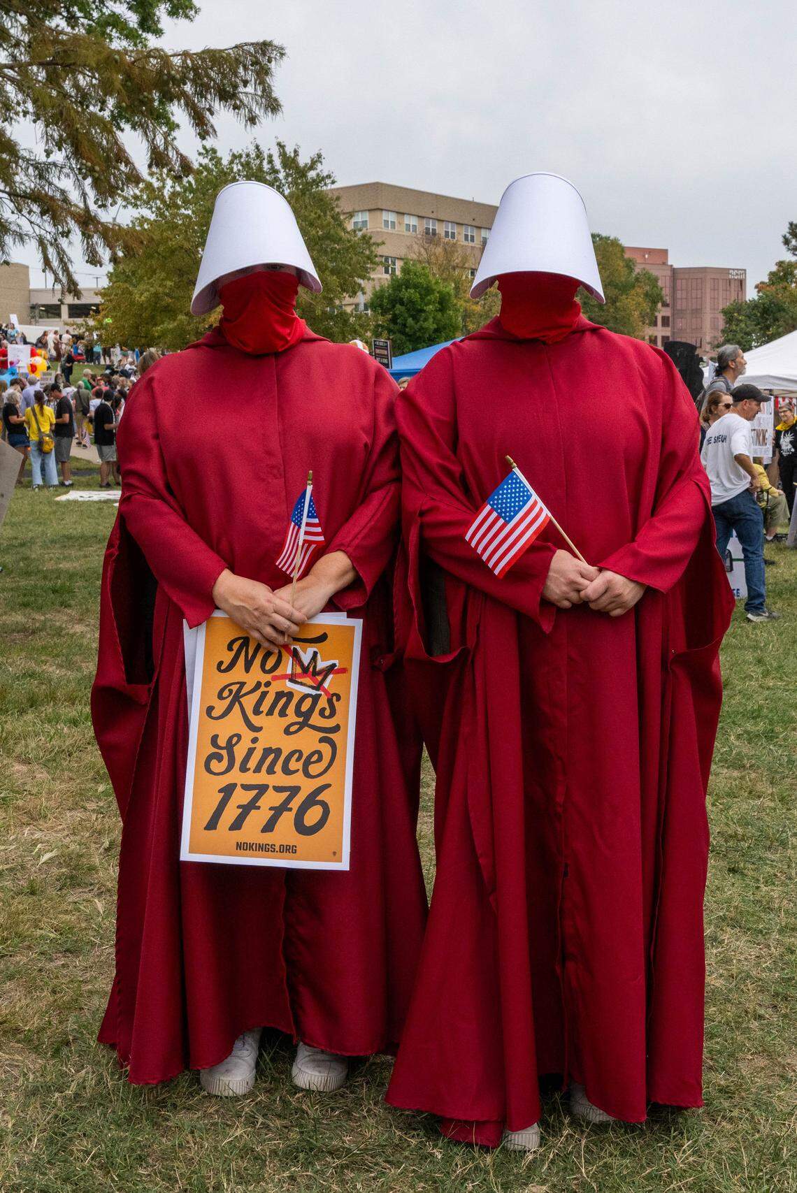 Demonstrators rally on Saturday, October 18, 2025, at Mill Creek Park in Kansas City as part of nationwide “No Kings” protests against the Trump administration. Protesters dressed up in costumes and brought signs showing their displeasure.