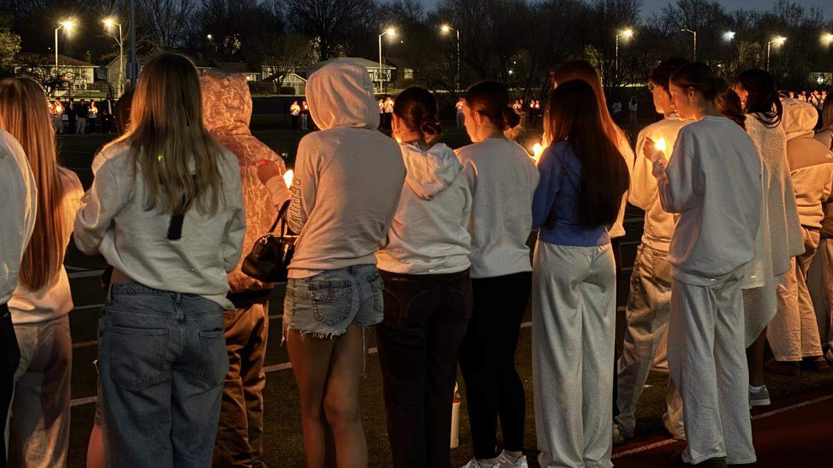 Hundreds gathered at Park Hill High School’s football field March 27, 2026, to mourn 18-year-old senior Tessa Walker, who was killed in a car crash in rural Platte County March 22.