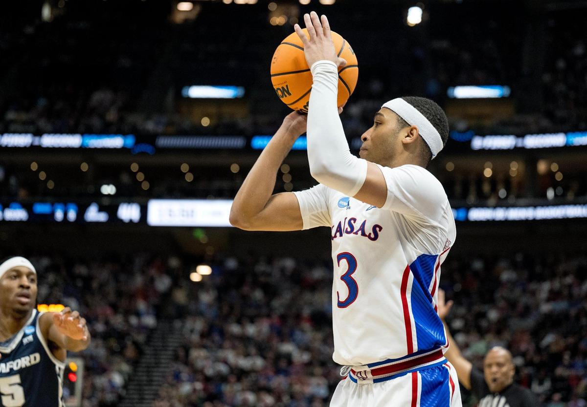 Kansas Jayhawks guard Dajuan Harris Jr. (3) shoots a 3-pointer against the Samford Bulldogs during a men’s college basketball game in the first round of the NCAA Tournament on Thursday, March 21, 2024, in Salt Lake City, Utah.
