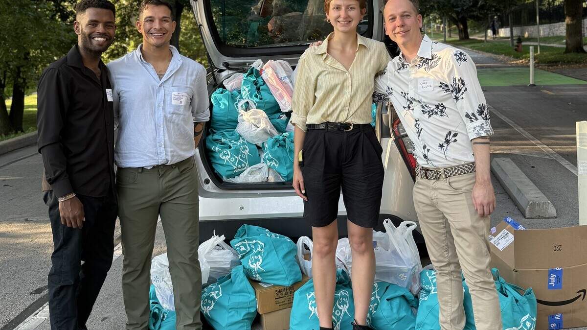 KC Kids Eat volunteers pose with bags of collected donations.