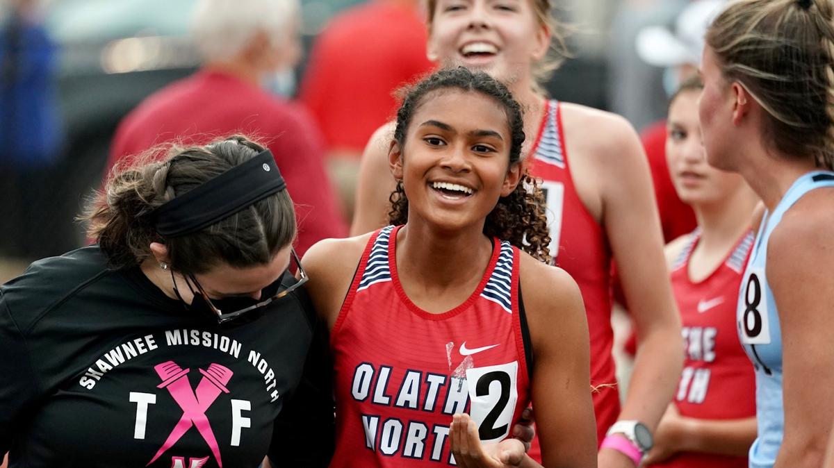 Olathe North’s Anjali Hocker Singh, pictured at center in a photo from social media, is now a two-time state champion in Kansas high school cross country’s largest classification. And she has two more years to add to her haul of medals ... she’s just a sophomore.