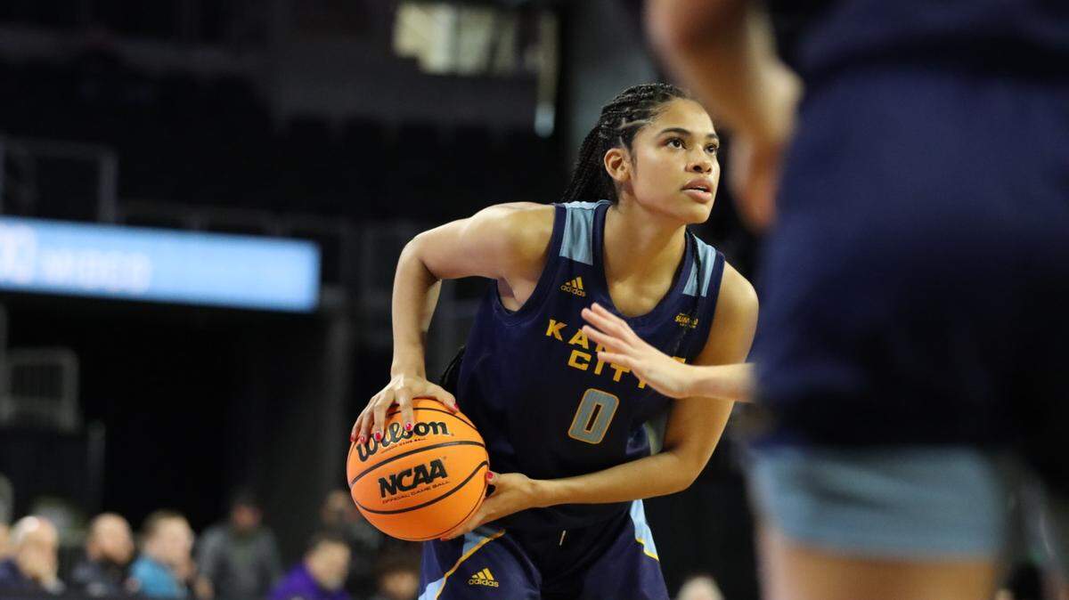 KC Roos senior E’Lease Stafford, a product of Lawrence HS in Kansas, holds the ball during a win over North Dakota State on March 4, 2023.